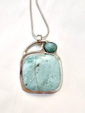 Beautiful, 2 inch, 925 marked, Larimar pendant on a silver chain.